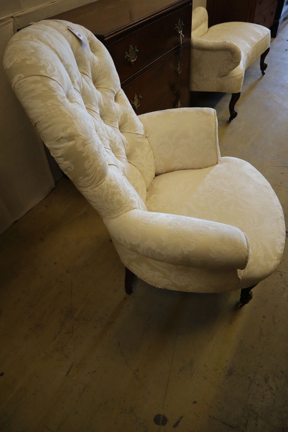 A Victorian walnut buttoned-back armchair, width 81cm